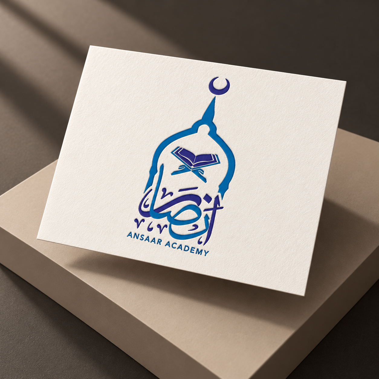Ansaar Academy Arabic logo in a contemporary stationery mockup