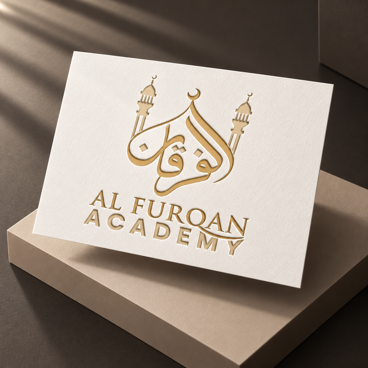 Al Furqan Academy Arabic logo in a contemporary stationery mockup