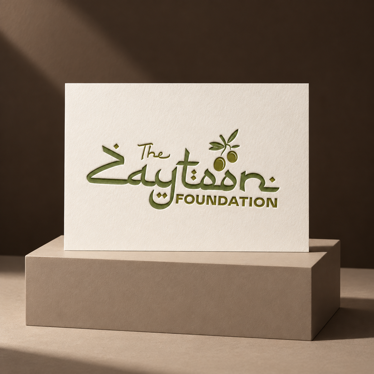 The Zaytoon Foundation calligraphic identity on ivory stationery