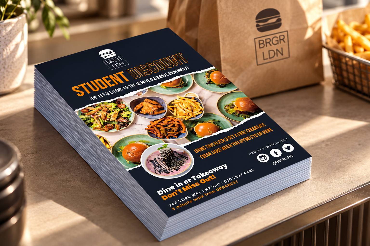 BRGR LDN promotional leaflets presented in a restaurant setting