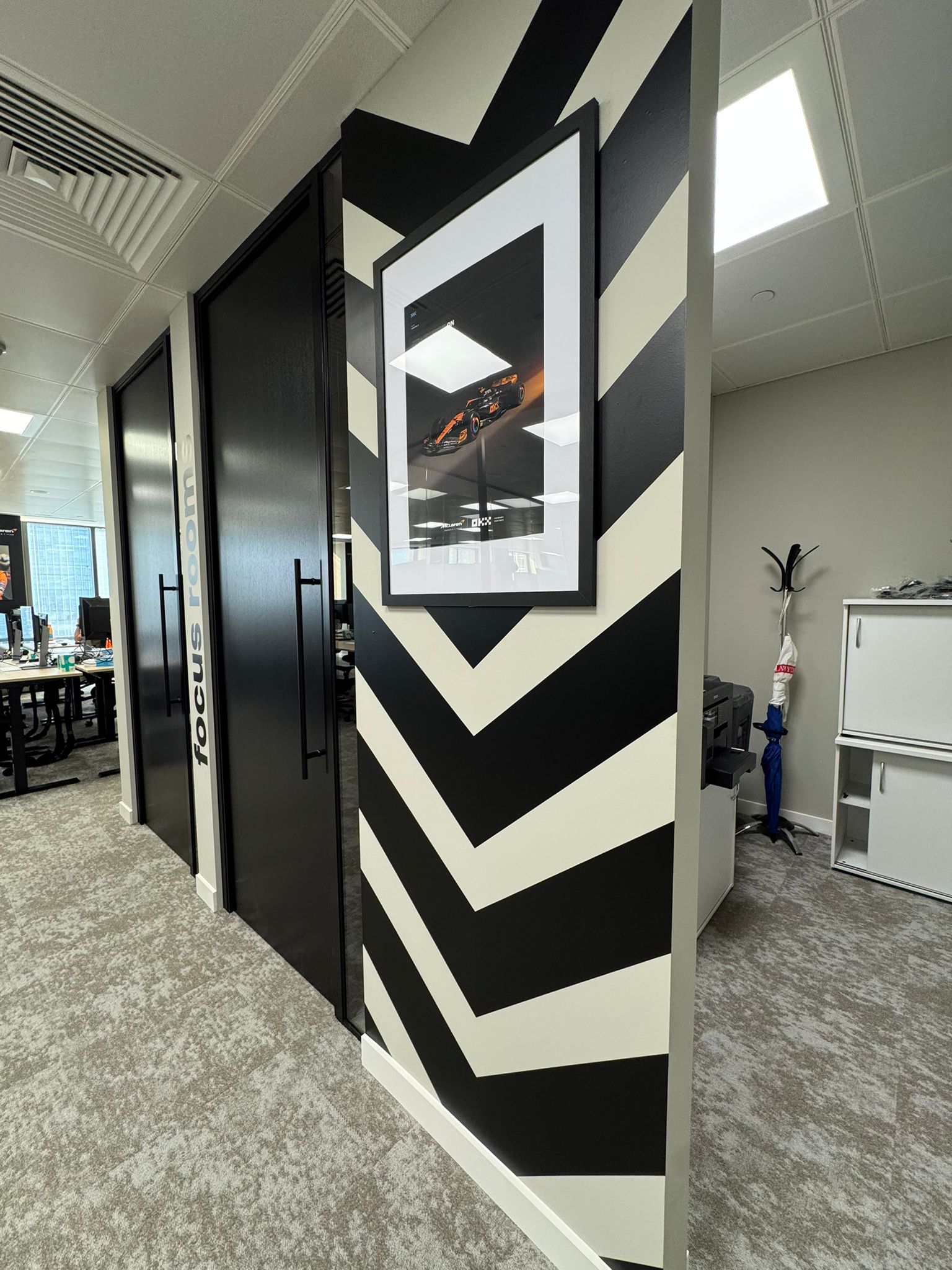 Black and white graphic wrap on an office pillar
